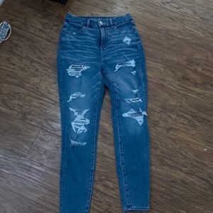 american eagle jeans with rips (uncovered) size 4.
